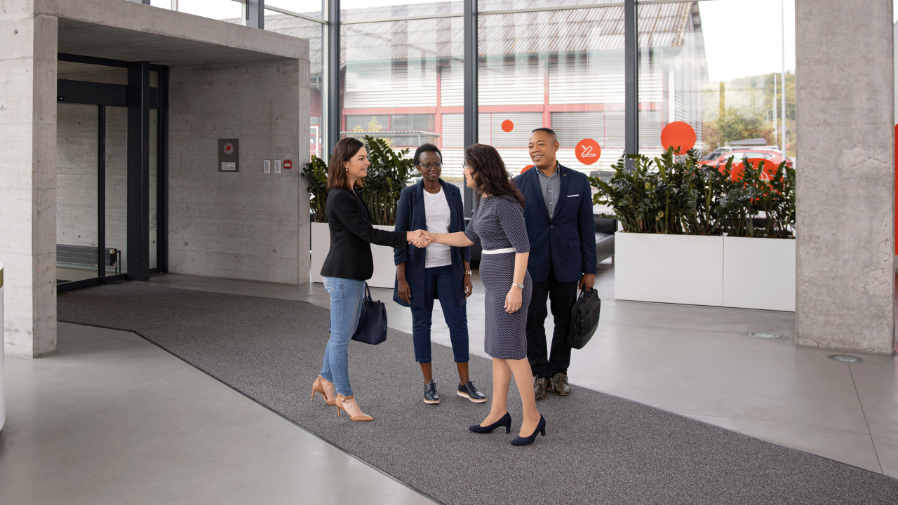 group of people greeting each other