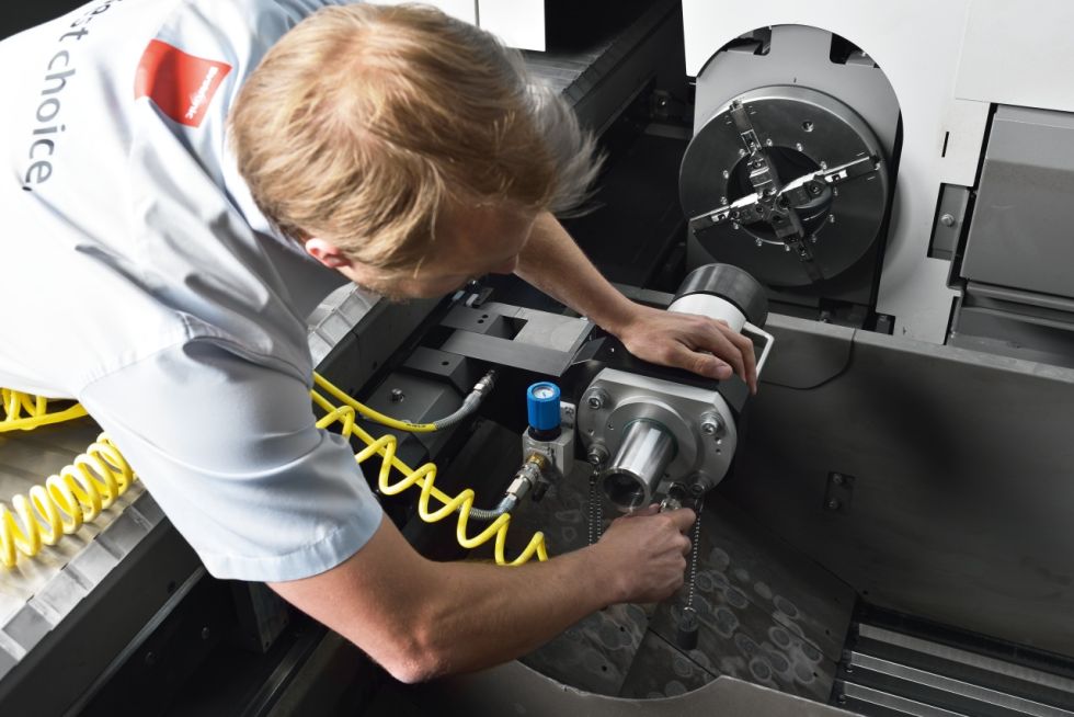 Integrated rotary axis facilitates a fast transition between sheet and tube processing.