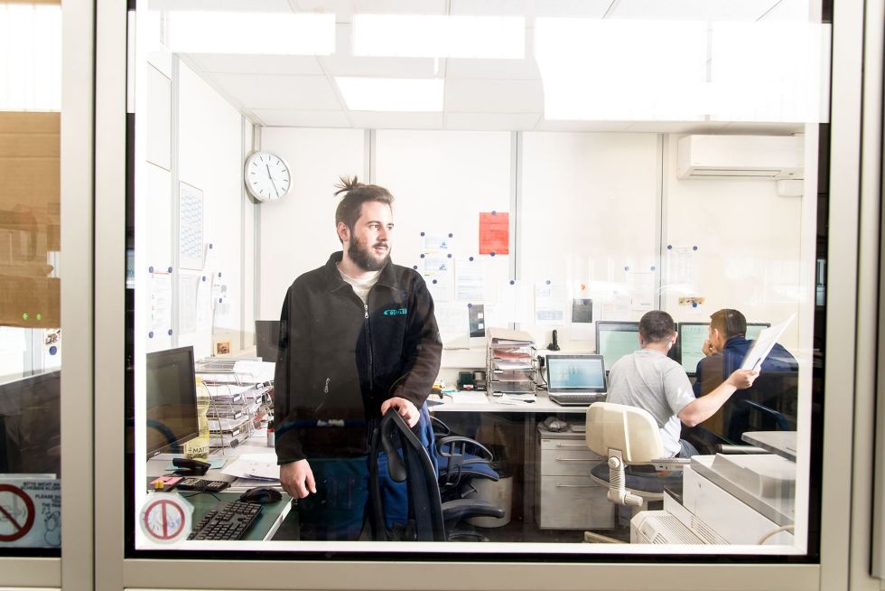 Mike Zwissler is programming the Xpert bending machines offline at the screen.