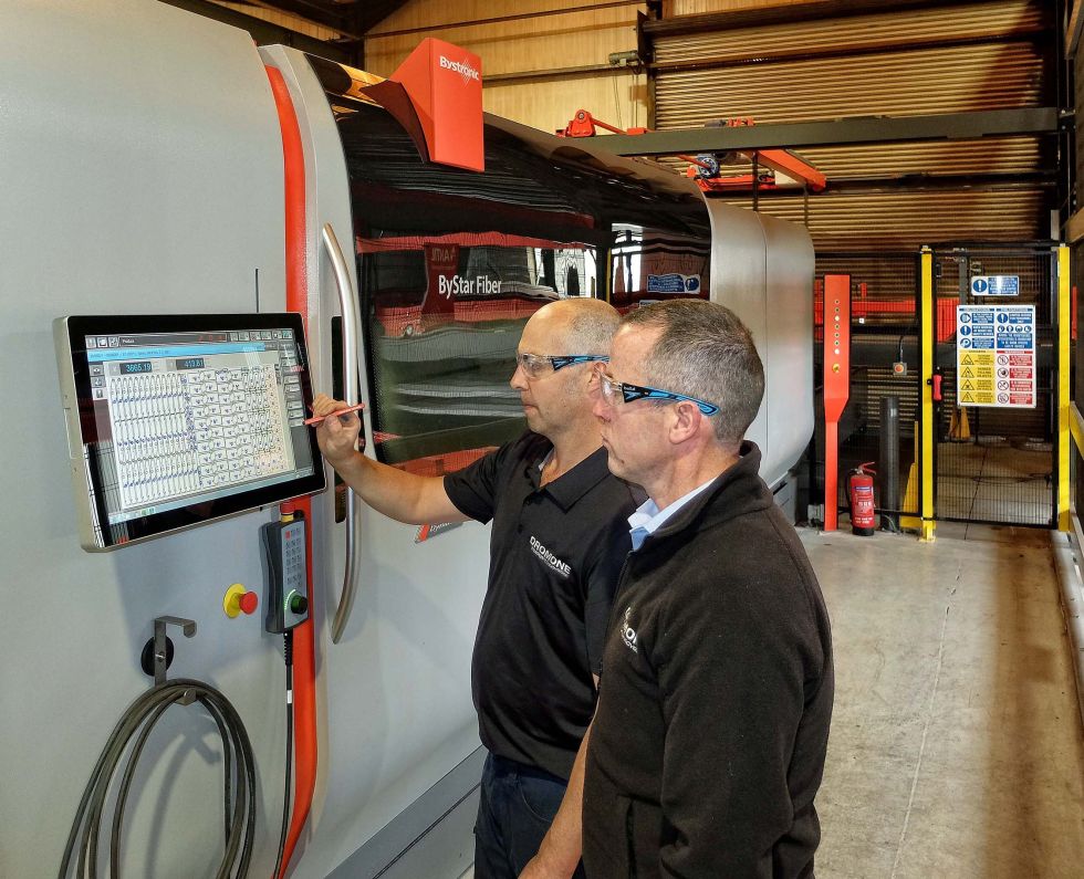 The Bystronic ByStar Fiber 4020 10 kW laser cutting machine installed at Dromone Engineering in March 2019. Ollie Devine, Maintenance and Capex Manager, is pictured right with Head Maintenance Technician David Gray.