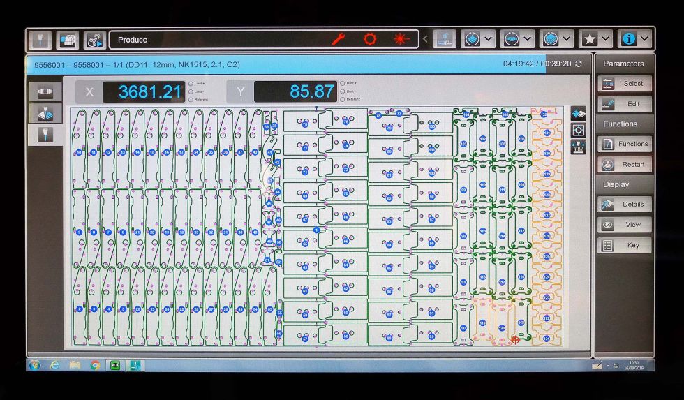 132 tractor hitch parts nested from single sheet  on the screen of the ByStar Fiber control.