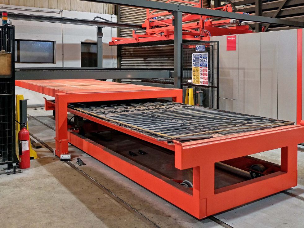 The offload tables were purpose-built by Bystronic so that they are of different widths and heights and run on rails, allowing one to pass beneath the other and enabling both to access sequentially a shake-out station at one end. A single table would have held up laser profiling, as the high speed of 10 kW fibre cutting would have meant the next cut sheet waiting for the table to become free.