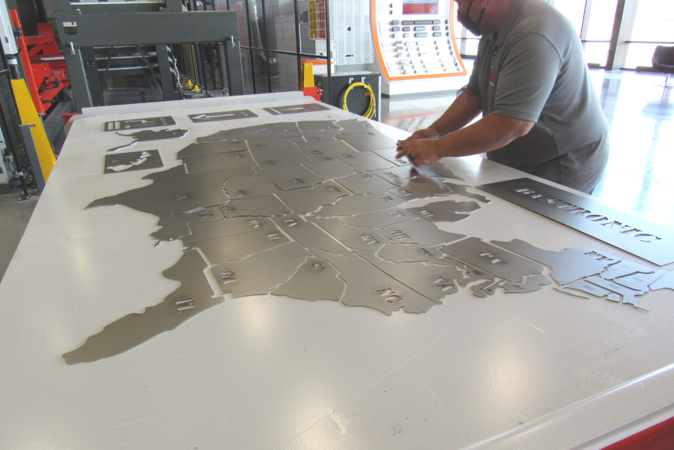 A map of the USA with each state cut by our laser cutting machines and sorted by BySort automation, was demonstrated.