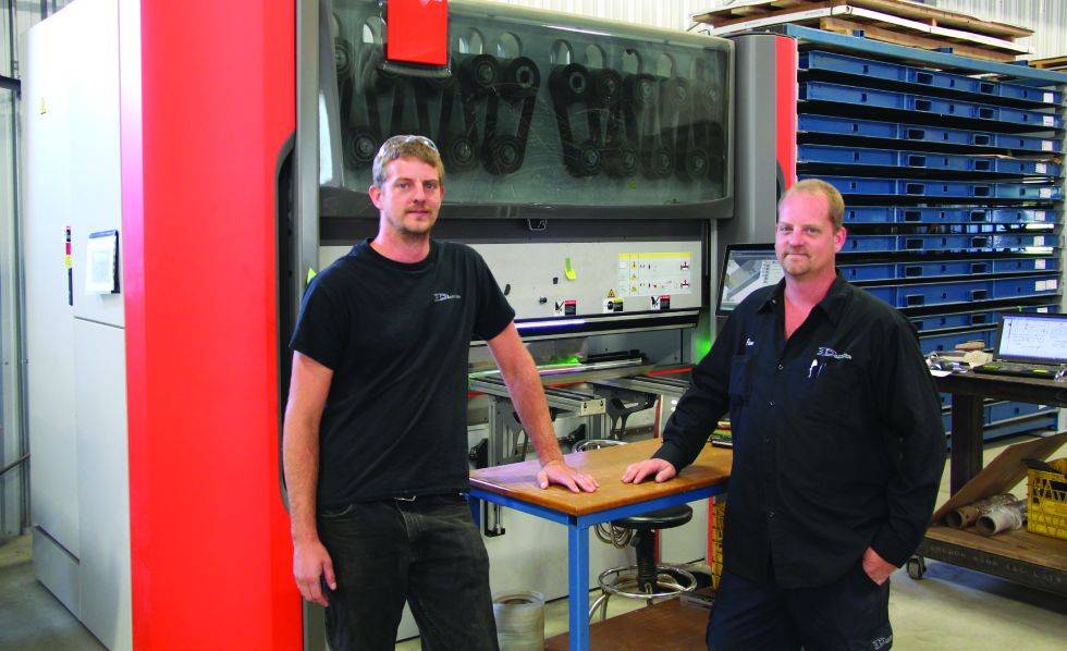 Demtool owners Derrick (l) and Jim Demerling in front of their new Xcite 80E electric press brake.