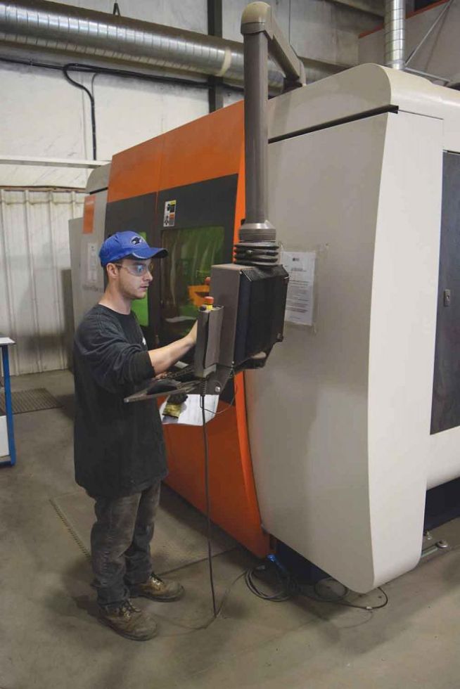 Hawk's laser operator Harley MacKnight at the controls of the Bystronic BySprint 3-kW fiber laser.