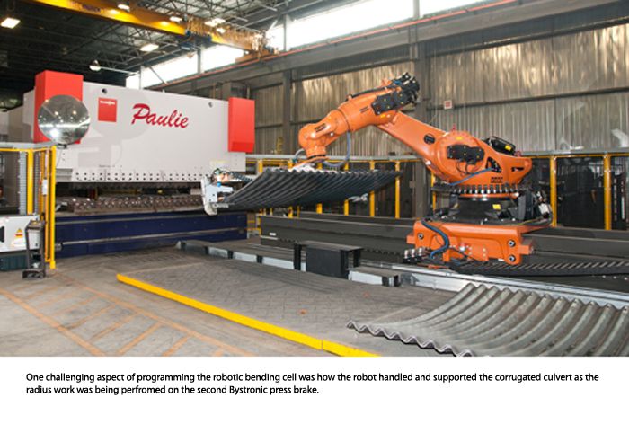 One challenging aspect of programming the robotic bending cell was how the robot handled and supported the corrugated culvert as the  radius work was being perfromed on the second Bystronic press brake.