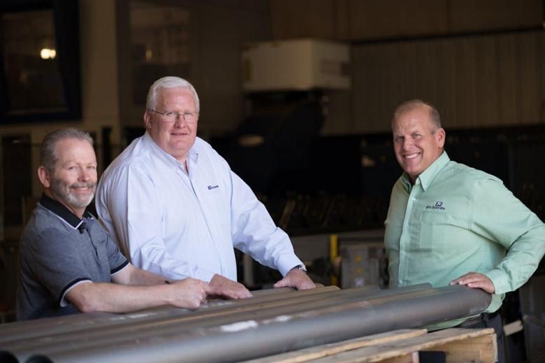 Figure 1. (From left) Dee Roskelley, senior vice president, President Sterling Jensen, and Kevin Jones, vice president of tube laser sales, said that the installation of a large tube laser has helped them to differentiate Richards Sheet Metal Works from regional competitors and expand its market base.